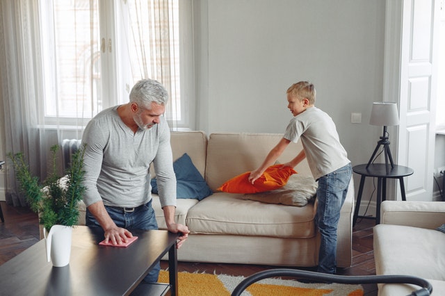 Man Cleaning Table