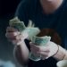 a person counting money cost to rent a dumpster