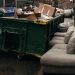 A dumpster and junk items, as we open our junk removal industry statistics and insights for 2024 article!