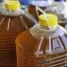 Two bottles of used cooking oil.