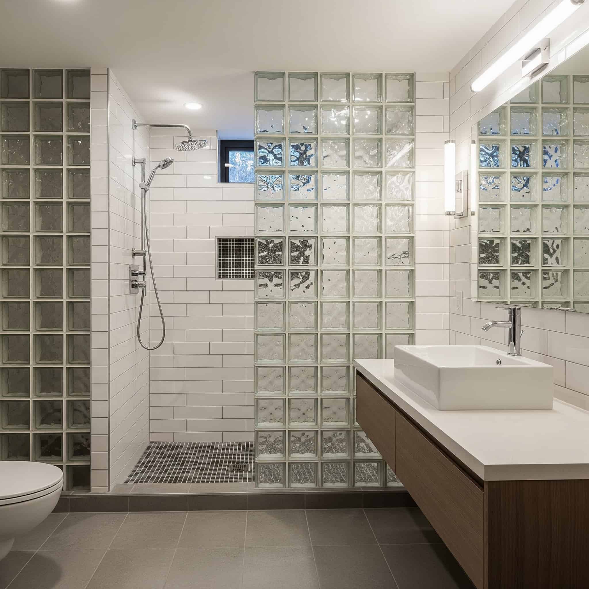 Glass block walls in a basement bathroom
