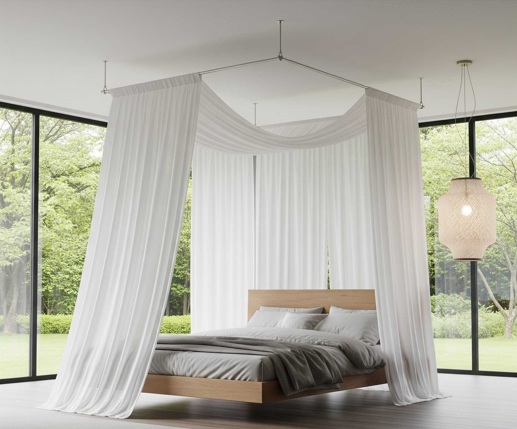 Modern bedroom with a ceiling-mounted canopy bed.