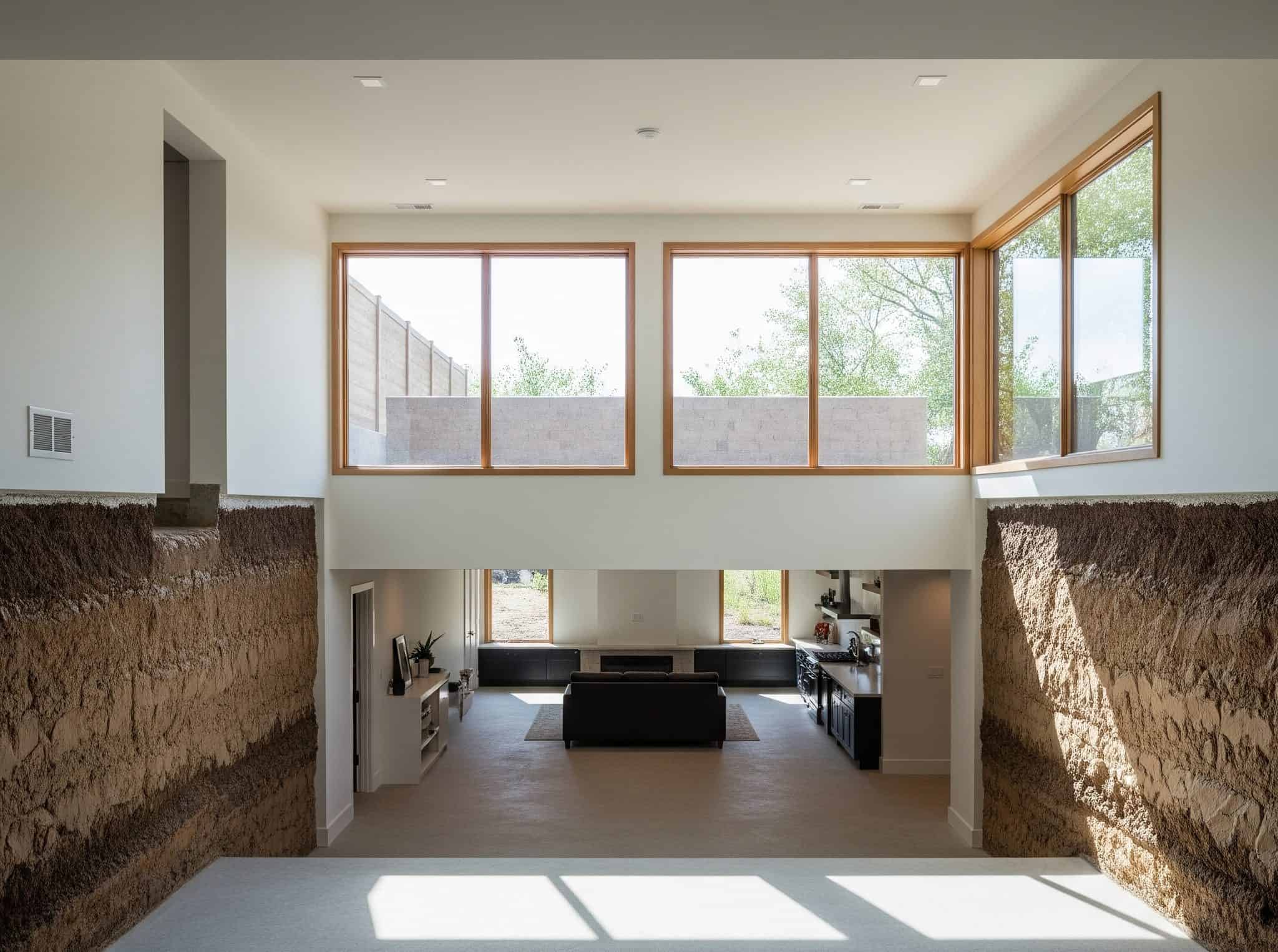 Subterranean basement space with impact-resistant glass windows.