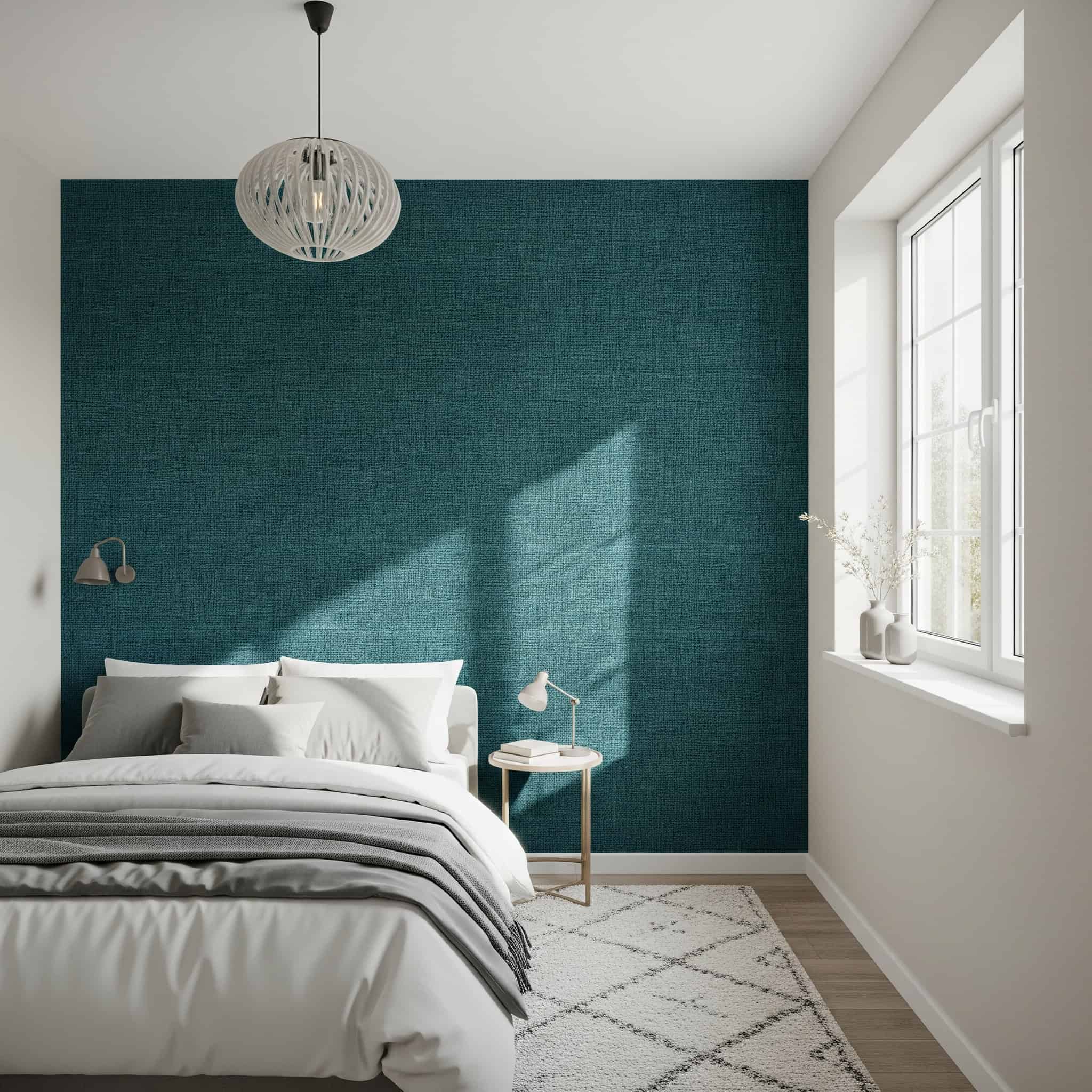Modern bedroom with a textured accent wall.