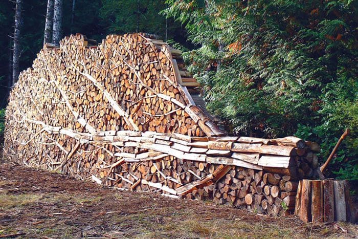15 woodpiles that have been stacked into gorgeous works of art