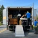 Local same-day junk removal company hauling away furniture and trash with a professional crew near your area