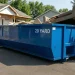 20 cubic yard dumpster size and dimensions illustrated in a residential driveway to help visualize capacity for rental decisions from JiffyJunk.com.