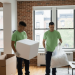 View of two professional workers from Jiffy Junk carefully collecting Styrofoam inside a home for proper recycling in a nearby disposal facility.