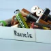 An image of used household batteries in a recycle box showing safe battery disposal and where to recycle old batteries near me