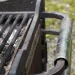 An image of a weathered outdoor grill with rusted grates and signs of heavy use, illustrating how to get rid of an old grill.